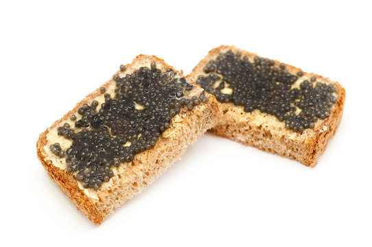 Black caviar sandwich isolated on white