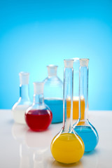 Laboratory glassware containing colorful liquid