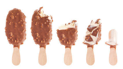 Chocolate ice cream being eaten up - 32781792