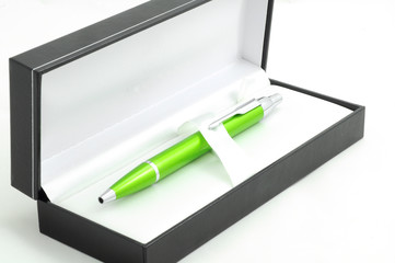 Green pen in luxury box