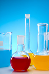Laboratory glassware containing colorful liquid