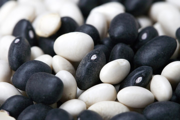Fototapeta na wymiar Assorted mixed black and white dried beans close-up