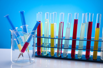 Laboratory glassware containing colorful liquid