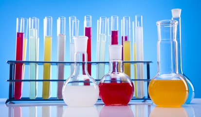 Laboratory flasks with fluids of different colors