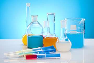 Laboratory glassware containing colorful liquid