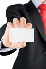 Blank business card in a hand