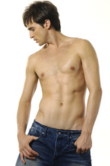 close up shot of a young mans upper body below the head