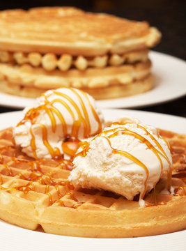 Belgian waffles with ice-cream and syrup
