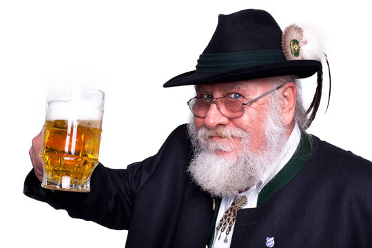 Mann in bayrischer Tracht mit Bierkrug