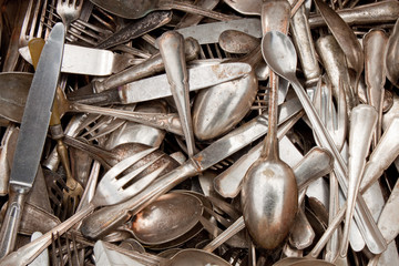 old spoons, forks, and knives on a flea market - 32800921