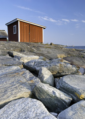 cabin on a stone beach