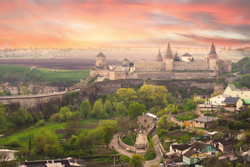 Fototapeta na wymiar Dramatic view on the castle in Kamianets-Podilskyi
