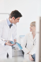 science people in bright lab