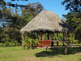 Fototapeta na wymiar Tropical hut with thatched palm roof in Panama, Central America