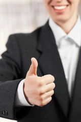 Thumb up success sign gesture