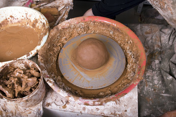 Clay lump on a potter's wheel