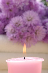 Obraz na płótnie Canvas Spa set – pink flowers and aroma candles,