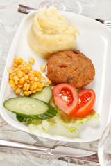 meat with potatoes and vegetables