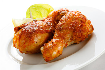 Roasted chicken drumsticks and vegetables