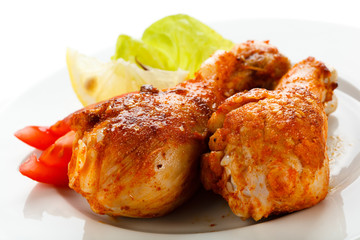Roasted chicken drumsticks and vegetables