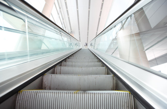 modern steps of moving business escalator