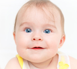 Smiling baby girl isolated on white