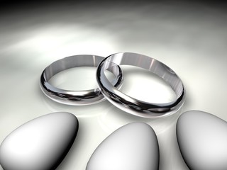 anelli nuziali e confetti