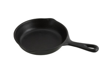 Black frying pan from cast iron isolated on white
