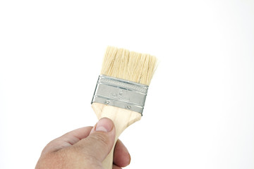 Paintbrush in a Hand