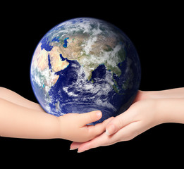 Child and woman holds earth globe