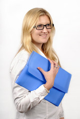 Beautiful young woman with glasses and blue office file