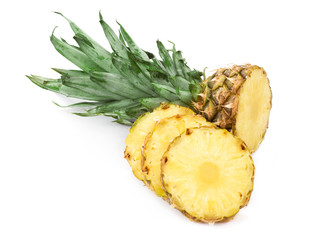 Ripe pineapple with lush green leaves