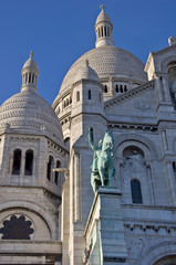 Obraz premium Basilica of Sacre Coeur in Paris. Against the blue sky
