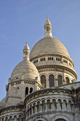 Obraz premium Basilica of Sacre Coeur in Paris. Against the blue sky.