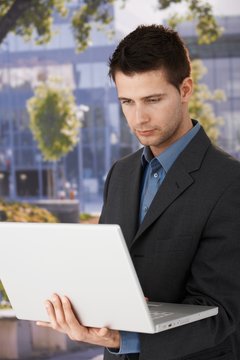 Young businessman with laptop