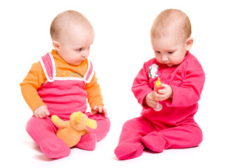 Two baby on a white background.