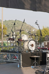 Detail of an open-air stage with a drum set