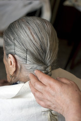 elderly woman with hairstylist