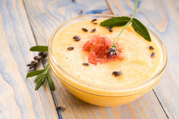 fresh melon soup with parma ham and lavender flower