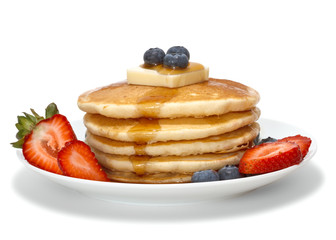 pancakes with fruits, butter and syrup