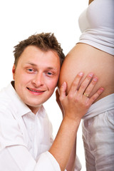 Fototapeta premium Pregnant woman with man isolated on white
