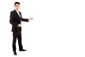 young business man full body presenting over a white background