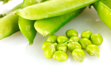 Green peas isolated on white