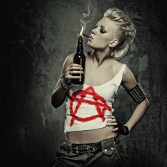 Punk girl smoking a cigarette