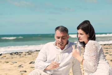 couples talking with glasses in hand