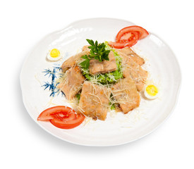 Caesar salad with slices of tuna