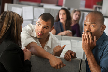 Embarrassed Man With Coworkers