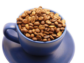 Coffee grains in a blue cup on a white background