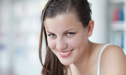 close-up portrait of a pretty female college student studying