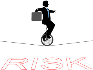 Business man unicycle tightrope over financial risk © Michael Brown